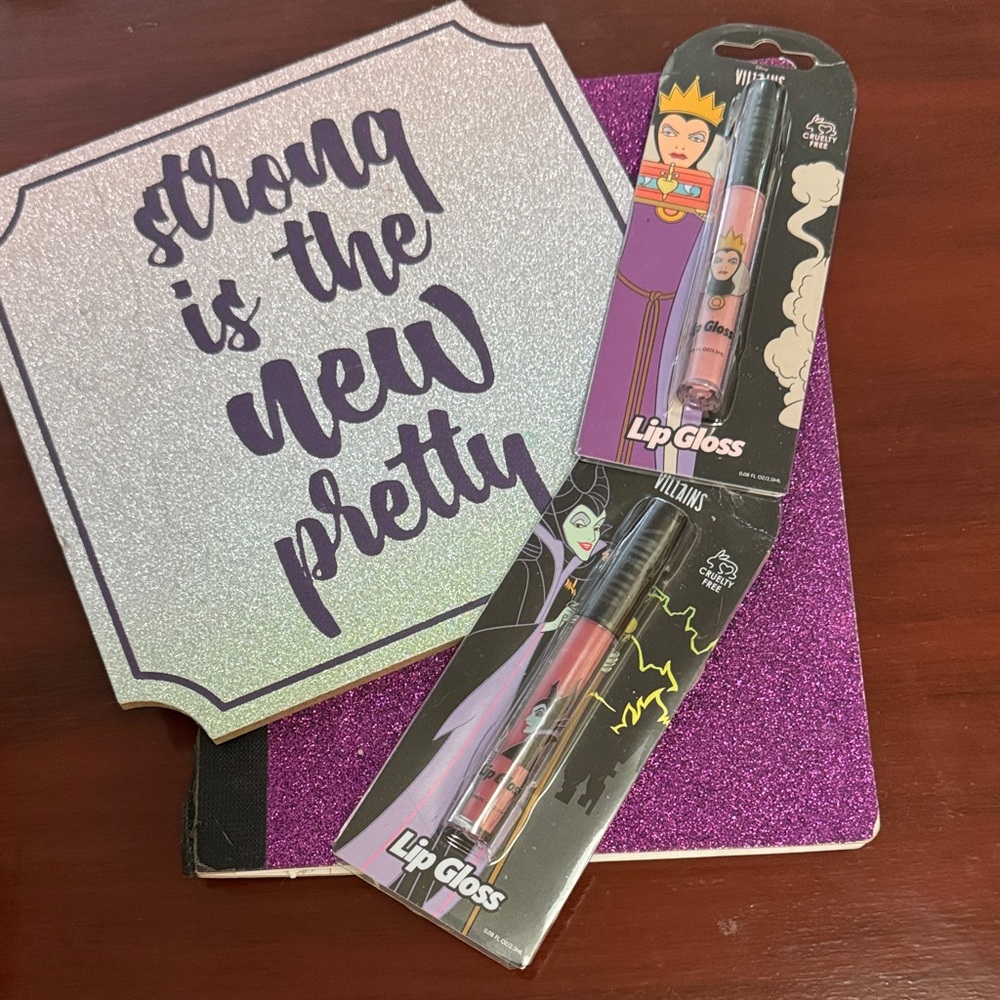 NWT 2 color DISNEY Female VILLAINS cruelty free lip gloss. Yes I see the irony.